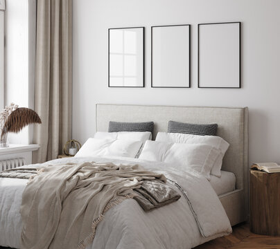 Poster frame mockup in white cozy bedroom interior with double bed, 3d render