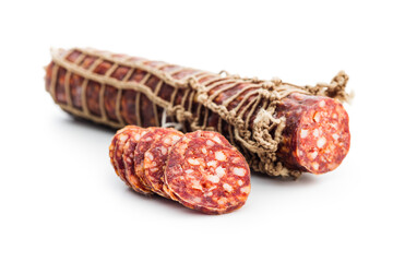 Smoked sausage. Sliced salami isolated on white background.