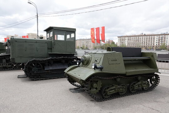 Light armored artillery tractor T-20 "Komsomolets" and tractor "Stalinets" at the exhibition of military equipment