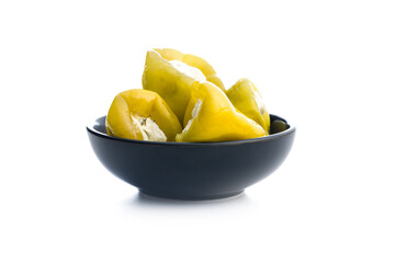 Peppers stuffed with cream cheese in bowl isolated on white background.