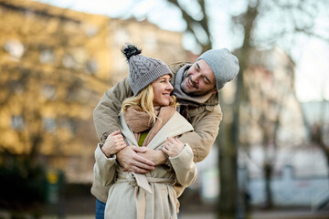 Embraced mid adult couple in the park