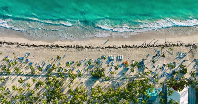 Sunrise over tropical ocean beach and caribbean sea. Aerial view of playa Bavaro, Punta Cana, Dominican Republic 4k video