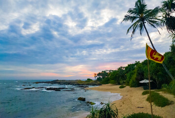 Beautiful tropical landscape on the ocean shore of Sri Lanka. Photography for tourism background, design and advertising.