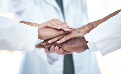 Hands stacked, doctors and closeup in healthcare teamwork, solidarity and support with hospital collaboration. cooperation of medical people, staff or employees together hand sign of clinic workforce