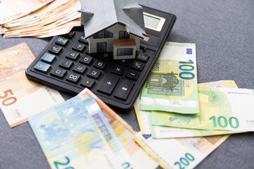 House symbol on American flag. Mortgage credit lending. Housing safety.