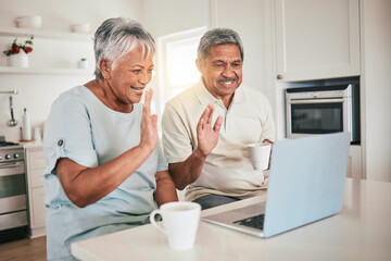 Laptop, video call and hello by elderly couple in a kitchen and happy or relaxed in home. Love, online and old people wave, smile and excited for tech conversation while enjoying retirement together