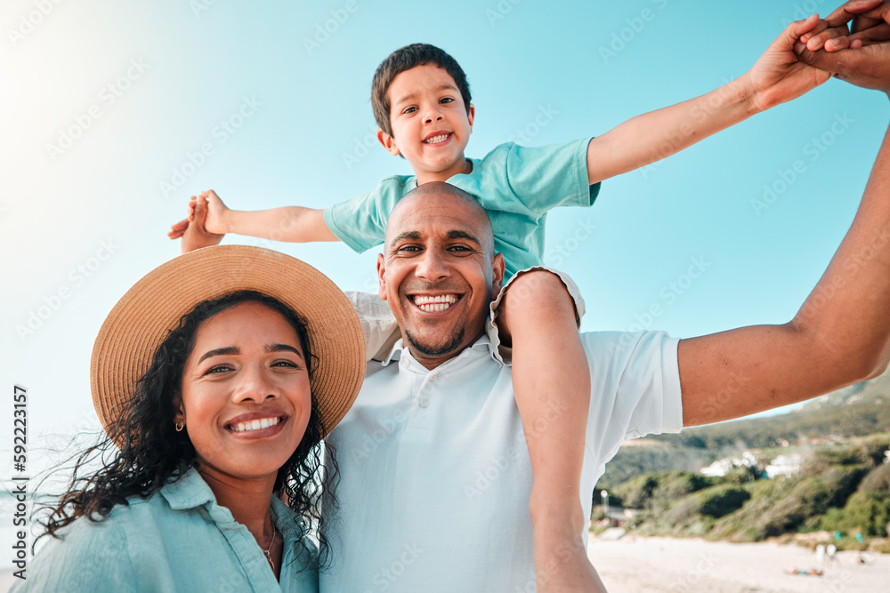 Wall mural Happy family, smile and portrait at beach for summer with child, mother and father for fun. Man, woman and boy kid playing for happiness and freedom on a holiday with love, care and support outdoor