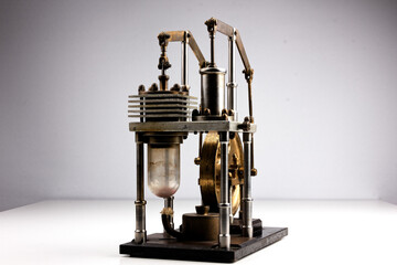 closeup of a stirling engine construction isolated on white