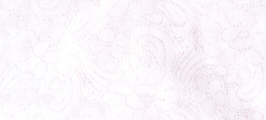 White tulle background with flower patterns.