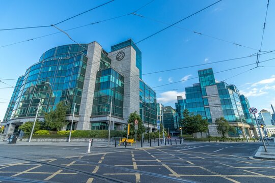 Low-angle shot of facade of IFSC House and Touche House with yellow line markings, Dublin, Ireland