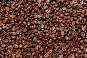 Top view of brown coffee beans, Roasted coffee beans background, Texture freshly roasted coffee beans. - 592229345