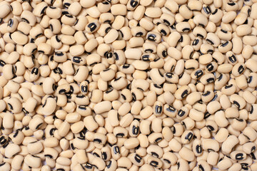 White cow pea beans (Black eye bean) texture background. Top view. Flat lay.