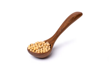 Soybeans in wooden spoon isolated on white background.