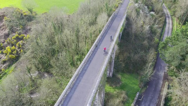 Cyclists on the Waterford cycling over a viaduct close to Dungarvan