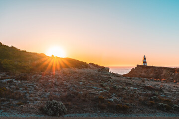 Spectacular view of the iconic Robe obelisk at sunset viewed towards the ocean, South Australia