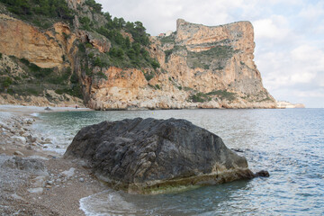 Landscape View at Moraig Cove Beach with Rock; Alicante; Spain - 592233390