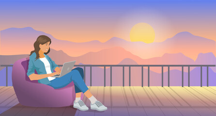 A girl working online on her computer chat with clients start up sitting in a big baggy lounge chair , holiday on vacation banner. Summer relaxation on vacation sunset  on the mountain view.