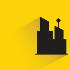 silhouette city building with shadow on yellow background