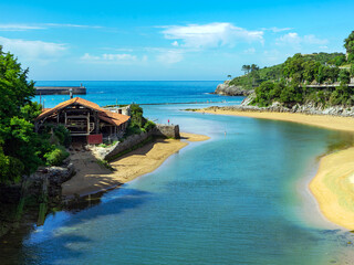 confluence of River Rio Lea into Atlantic Ocean In Lekeitio. mouth of river Lea Basque Country, Spain.