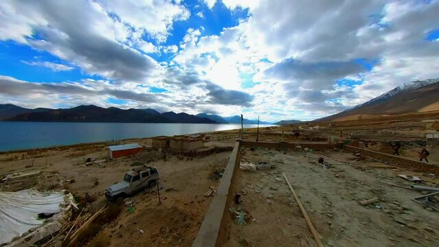 Time lapse of Captivating Clouds over Pangong Lake with Sun Rays and Mountain Ra