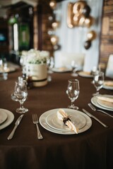 Vertical shot of a festive table and 18 birthday decorations with golden anniversary balloons