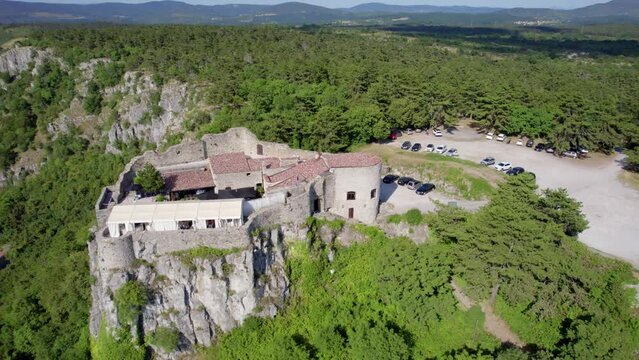 Aerial view of the historic San Servolo Castle in Crni Kal, Slovenia