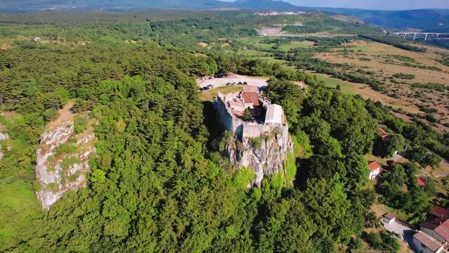 Aerial view of the historic San Servolo Castle in Crni Kal, Slovenia