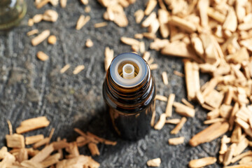 A bottle of aromatherapy essential oil with white sandalwood