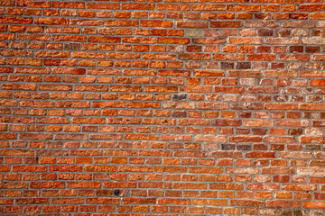 dark texture of old red bricks wall background