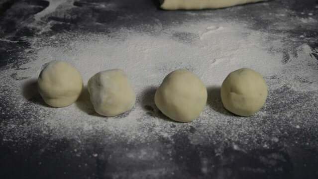 potato dough plum gnocchi individually prepared on the table ready to be cooked	
