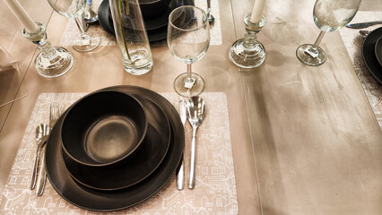 Empty plates and mugs on the table. Beautiful table setting. Top view and background