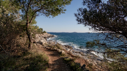 Fototapeta na wymiar bay in croatia with blue water and blue sky