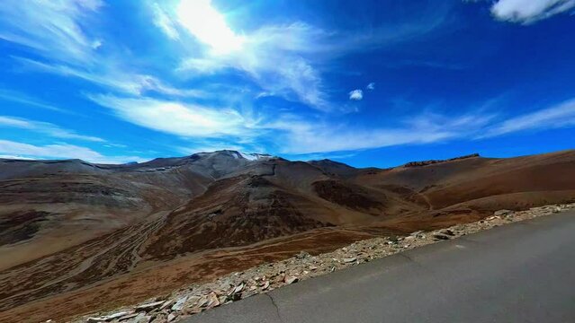 Early morning car journey on a scenic mountain highway road.
