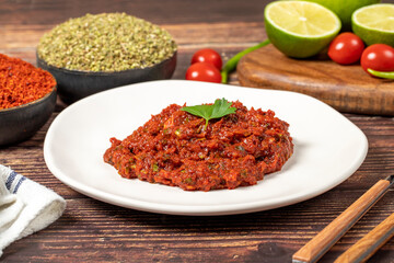 Hot chili peppers harissa sauce. red chili paste or adjika