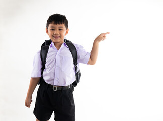 Excited wow fingle point up and side. Thai school uniform with backpack bag. Portrait Young Asian cute boy standing on white background banner. Back to school.