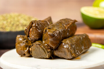 Olive oil leaf wrap. Aegean cuisine delicacies. Grape leaf wrap with rice stuffing. local name zeytinyagli yaprak sarma. Close up