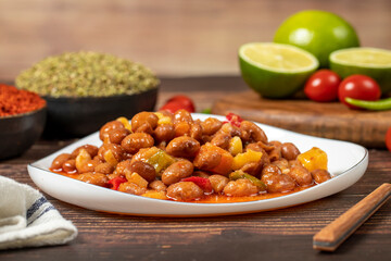 Kidney beans dish with olive oil on wood floor. Healthy foods. Aegean cuisine delicacies.