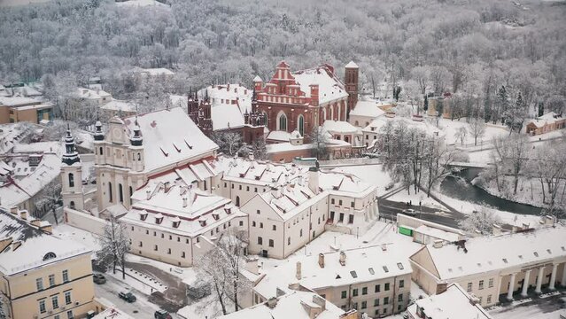 Drone aerial view of St. Anne and Bernardines Churches on winter day. VILNIUS, LITHUANIA - WINTER 2023.