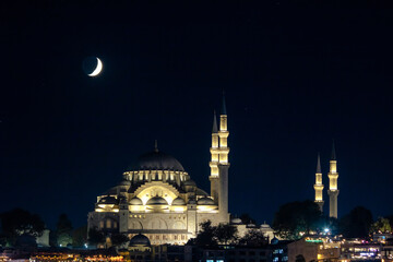 Fototapeta na wymiar Islamic photo. Mosque and crescent moon. Ramadan or laylat al-qadr concept