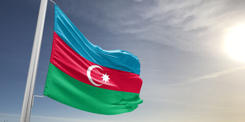 Azerbaijan national flag cloth fabric waving on beautiful sky Background.