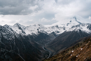 View of the valley and Mount Elbrus in the cloud