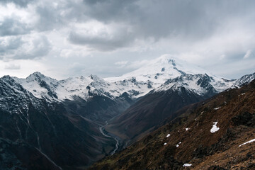 View of the valley and Mount Elbrus in the cloud