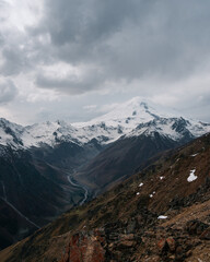 View of the valley and Mount Elbrus in the cloud