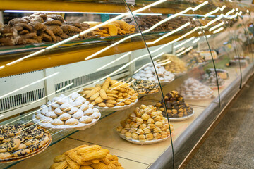 Oriental sweets in the supermarket. The counter with oriental sweets