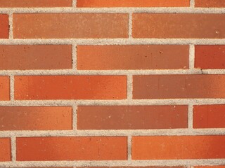 texture of a brick wall with red bricks