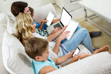 Family using various technologies