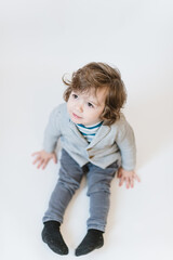 Close-up portrait of child lovely sweet curious cheerful cheery smart clever boy fantasize copy space isolated white color background