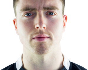 A rugby player looking at the camera