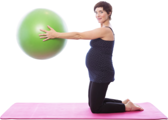 Portrait of pregnant woman lifting exercise ball