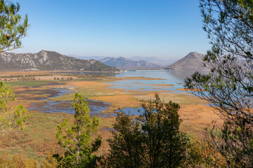 Panoramic view of Lake Skadar National Park in autumn seen from Virpazar, Bar, Montenegro, Balkans, Europe. Travel destination in Dinaric Alps near the Albanian border. Stunning landscape and nature